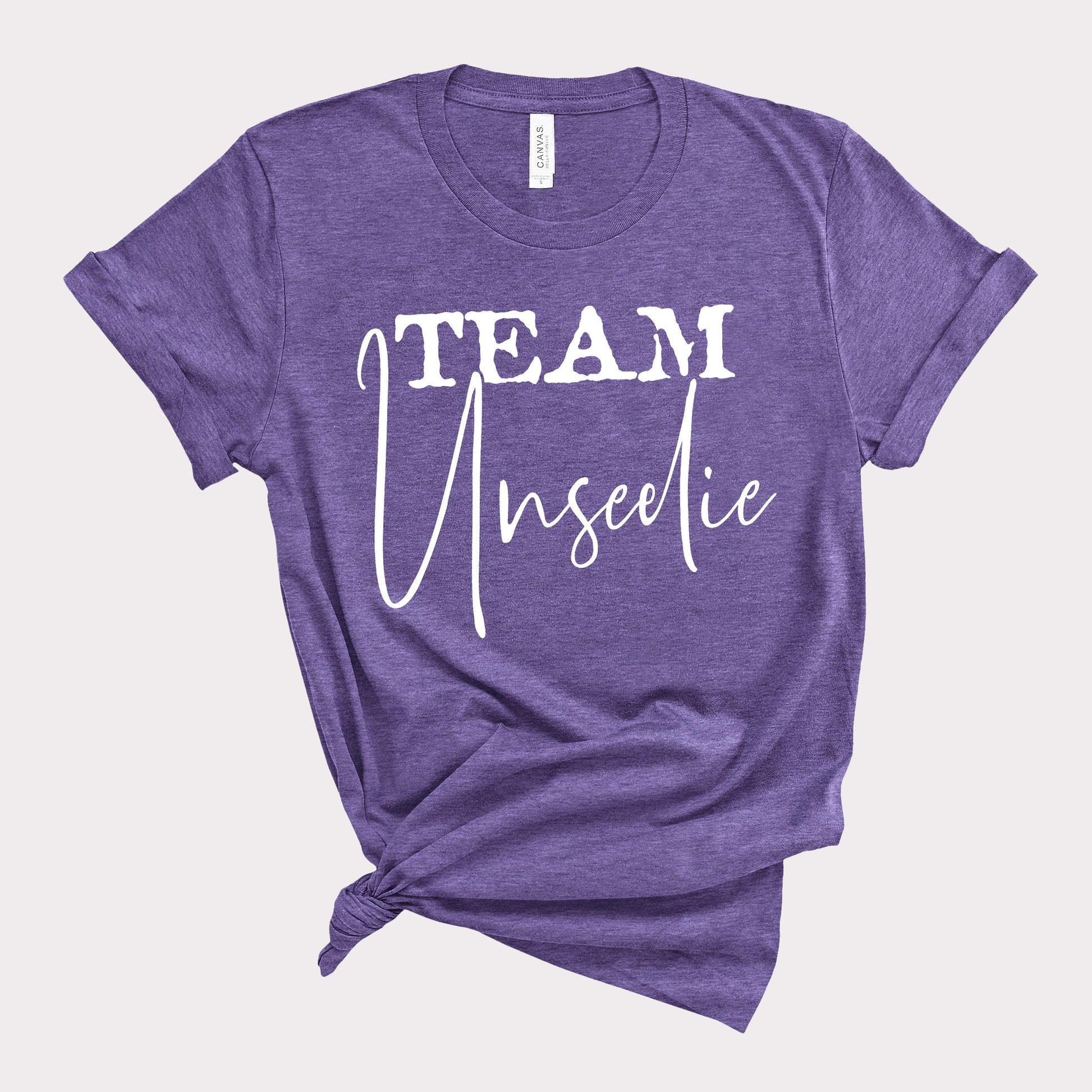 Heather team purple bookish tee with team unseelie in white